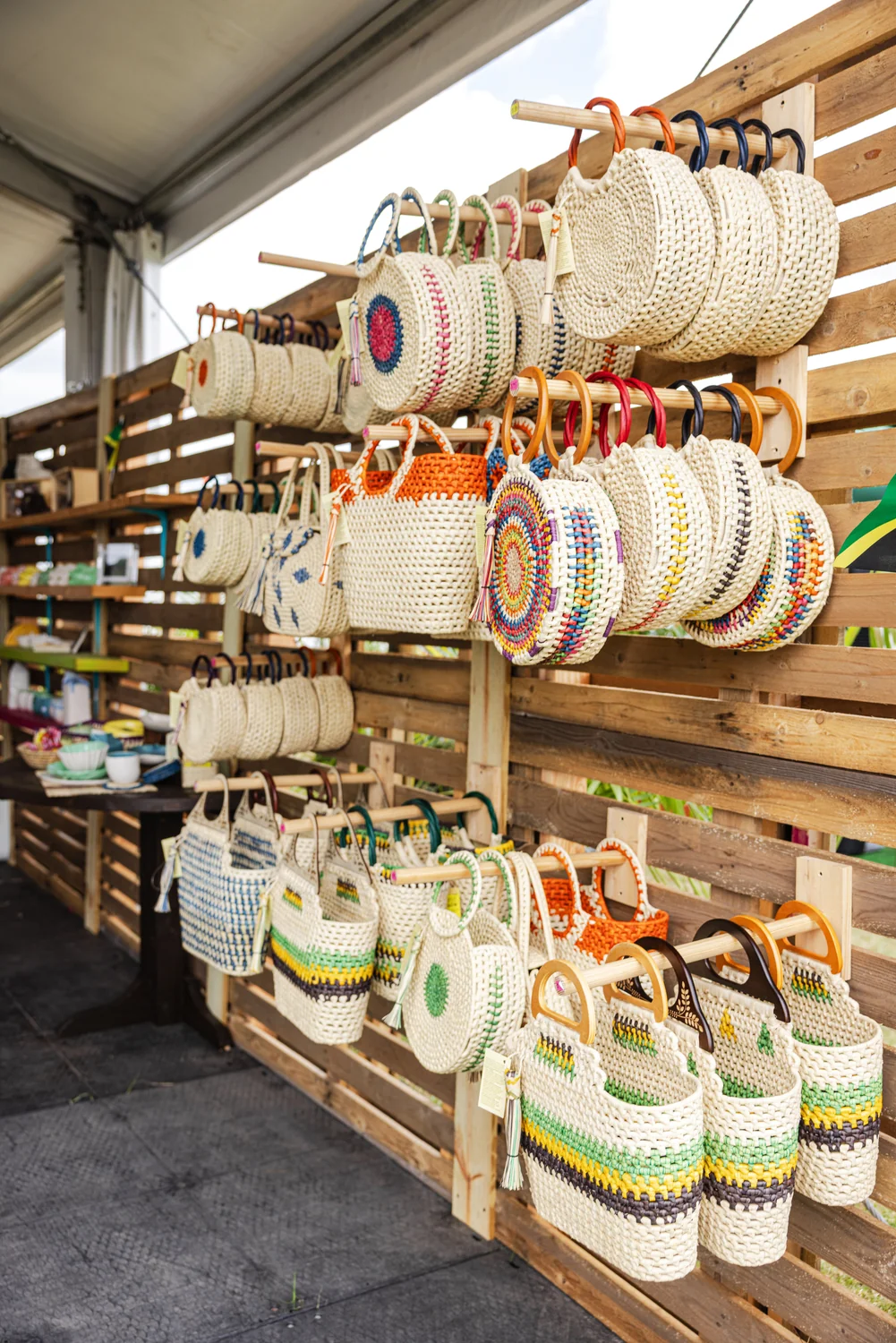 Handwoven straw bags and baskets crafted by Caribbean artisans on display at the Cultural Exchange Pavilion