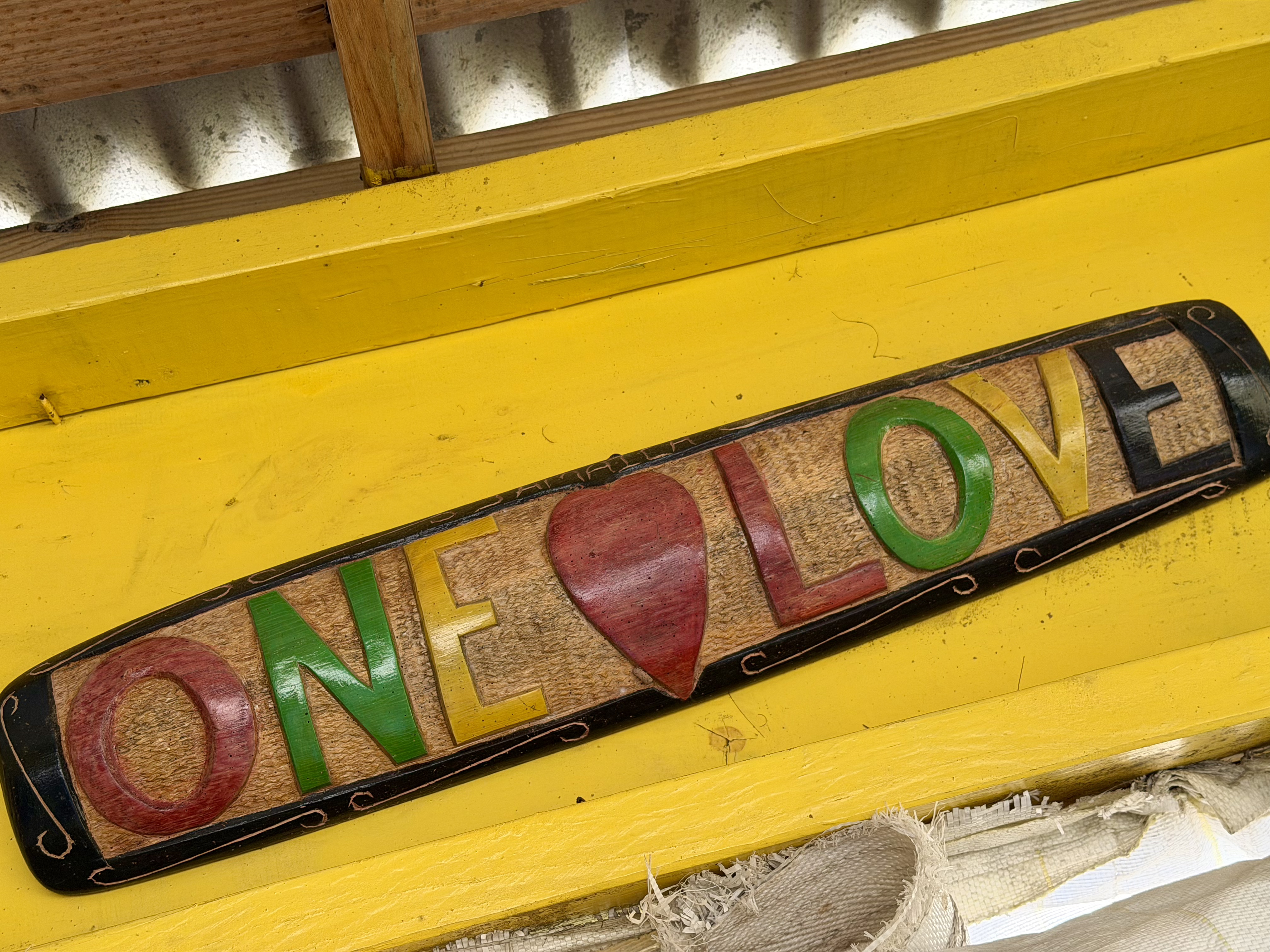 Hand-carved One Love sign
